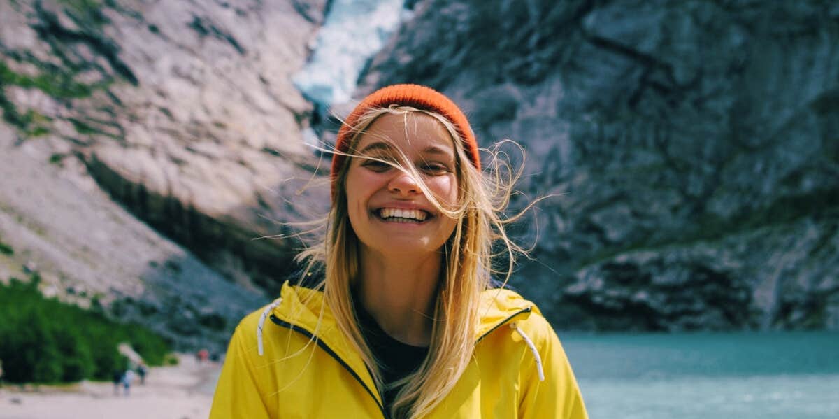 10 Uncomfortable Signs You're Growing As A Person woman smiling