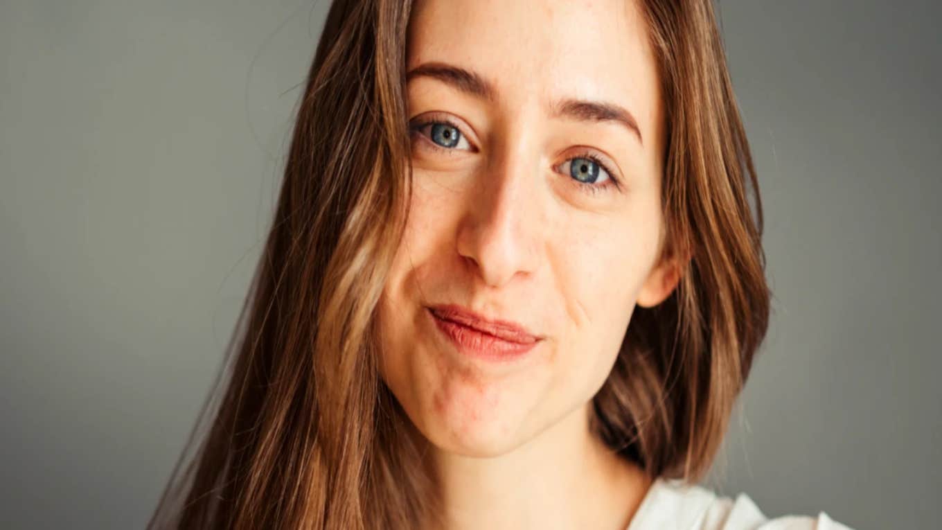 woman smiling looking forward