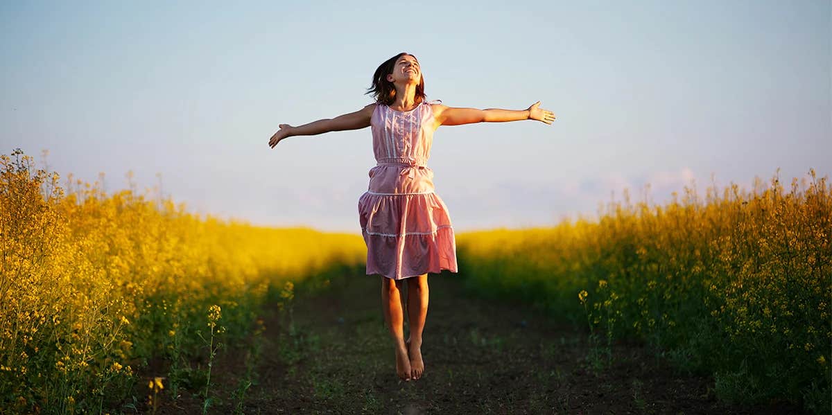 happy woman in a field