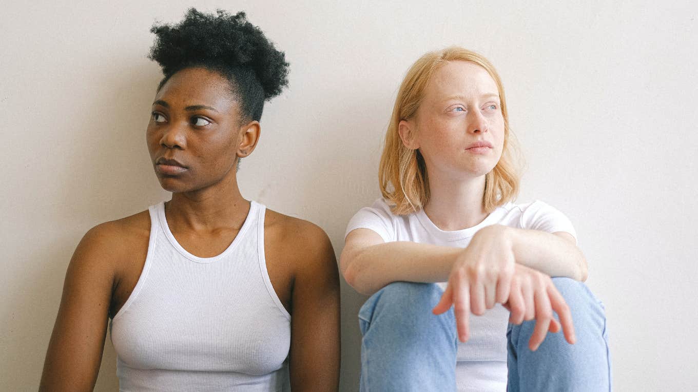 The Simple Clue That Tells You When A Person In Your Life Is Not Meant For You two women sitting next to each other