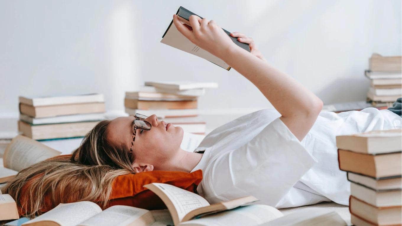 woman in glasses reading 
