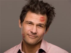 5 Things Men Love About Being Single man with lipstick kiss on face
