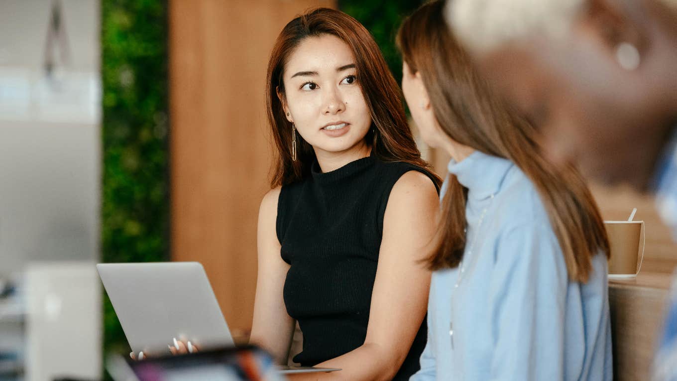 female coworkers talking