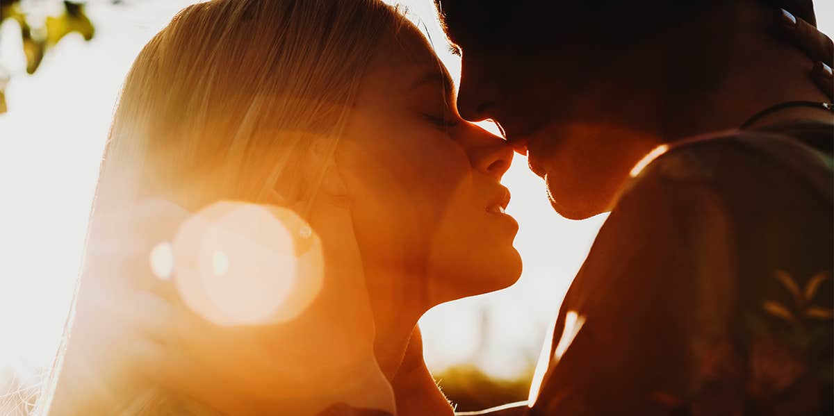 man and woman about to kiss