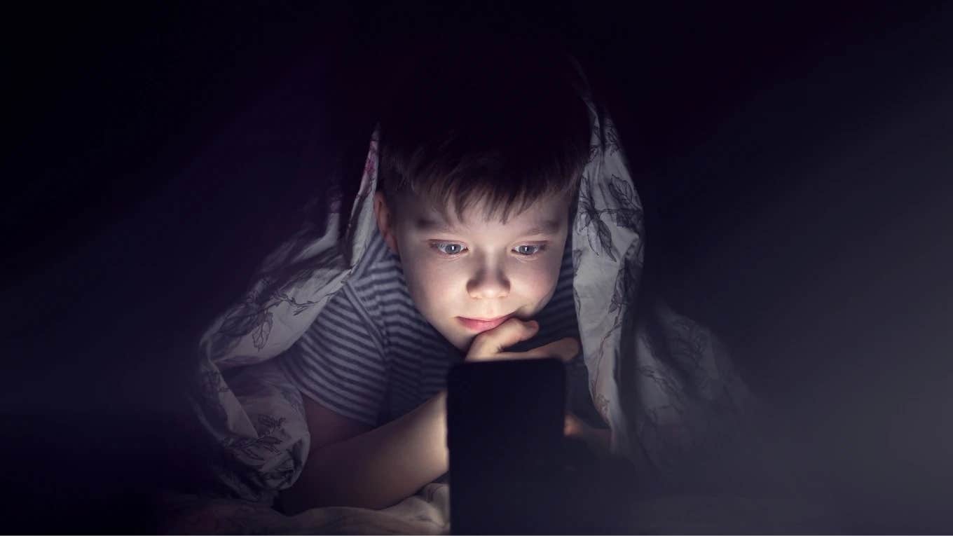 kid secretly using cellphone at night