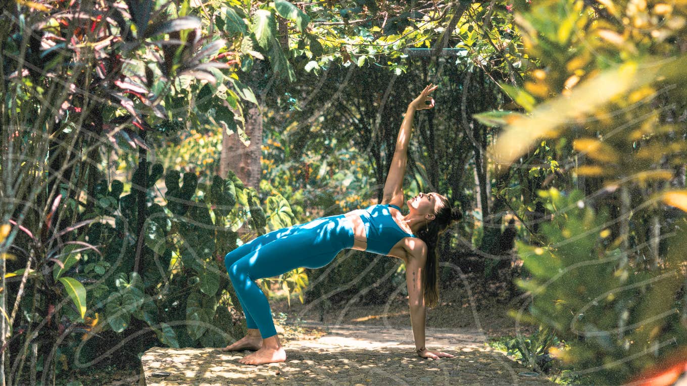 Author doing yoga in amazon forest