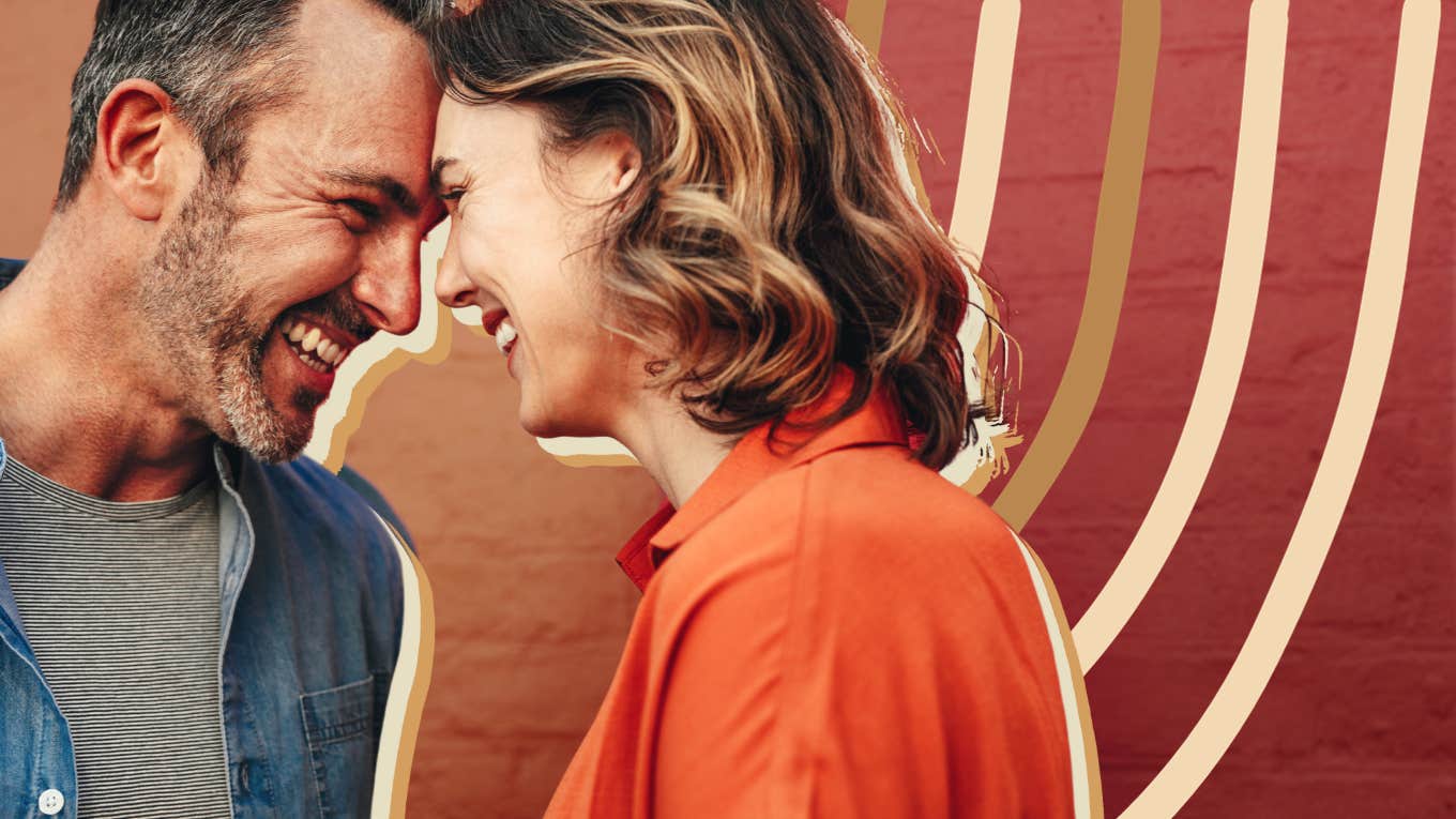 Couple foreheads connecting, smiling with understanding