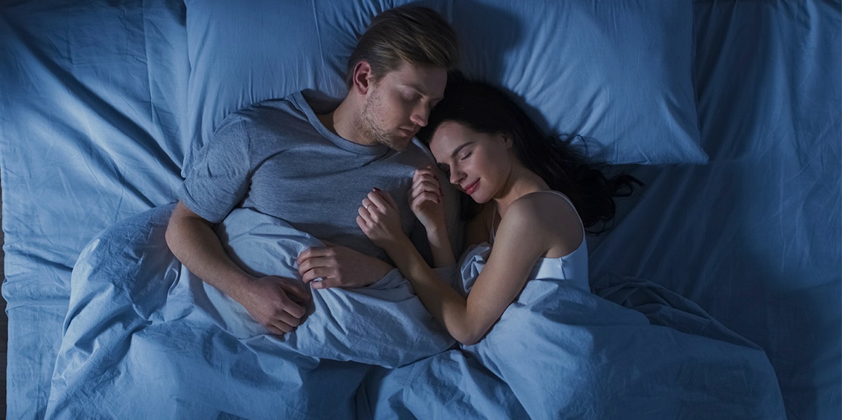 What Your Sleeping Pattern Says About How Good Your Relationship Is sleeping couple