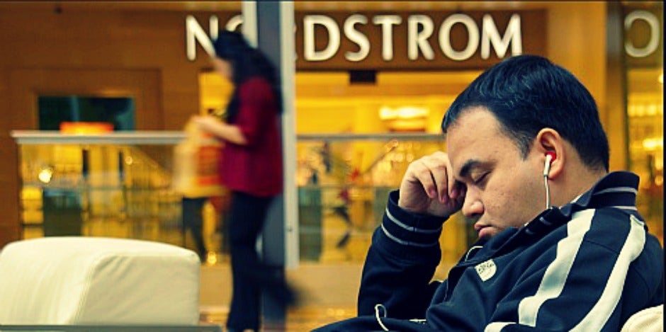 man sleeping at mall