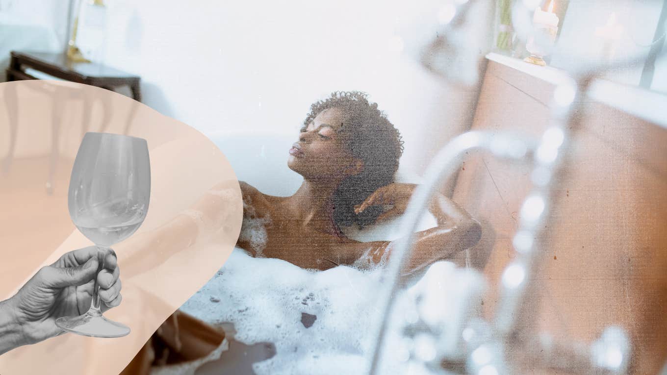 Woman getting into a hot bath after a long day, her guy handing her wine