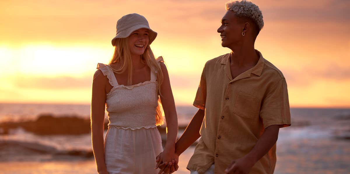 How Smart Women Weed Out Losers To Find Mr. Right couple holding hands walking on the beach