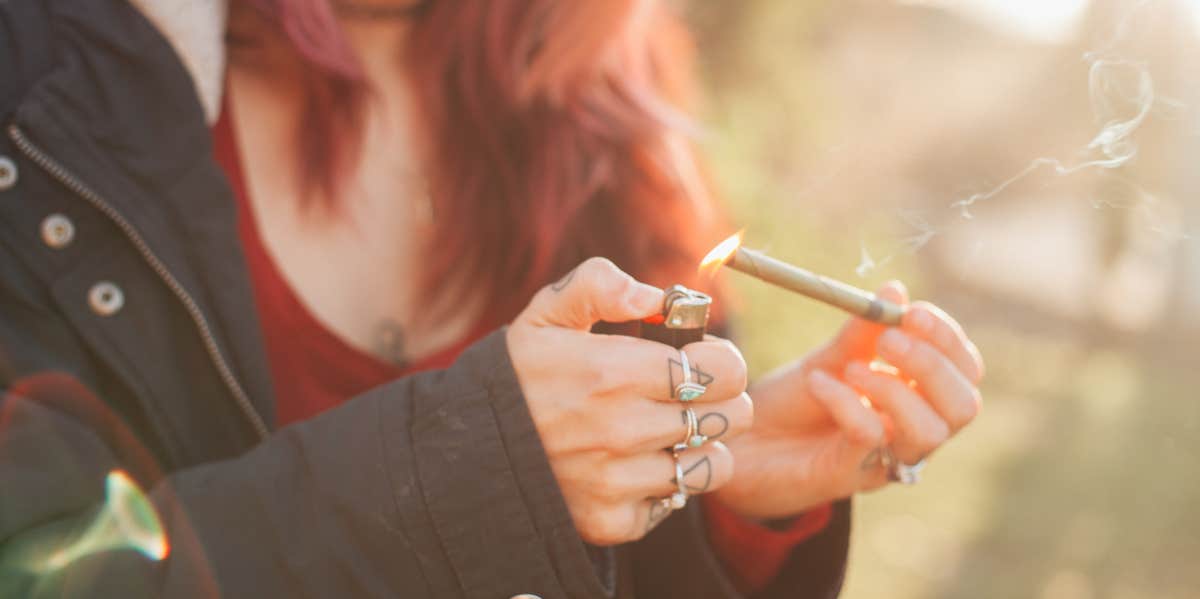 woman smoking marijuana