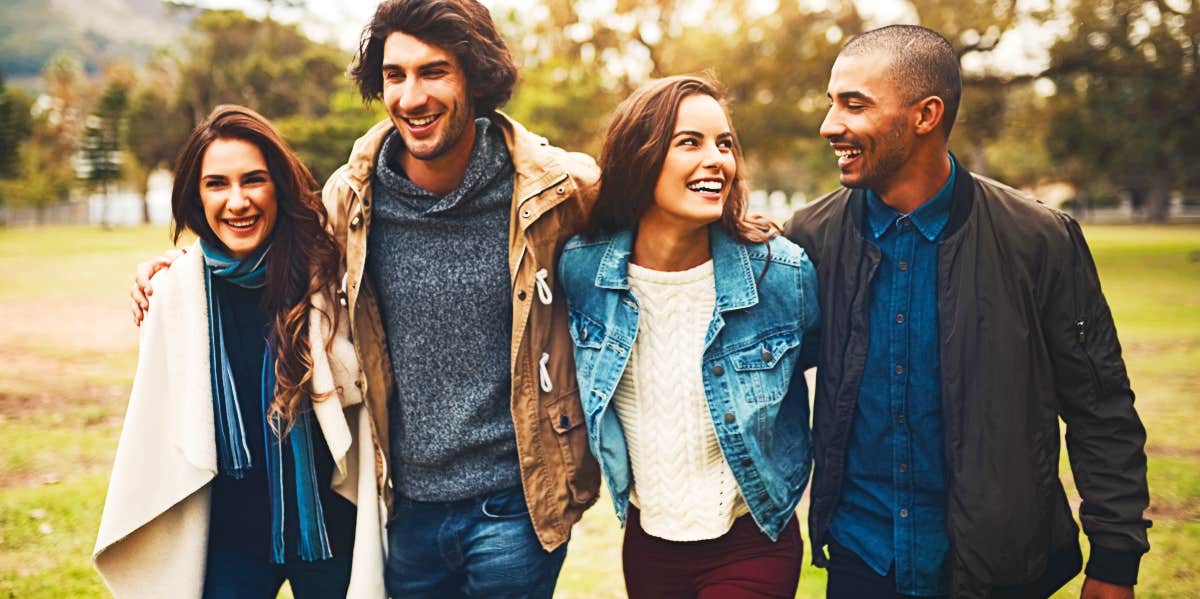 Group of friends walks in park