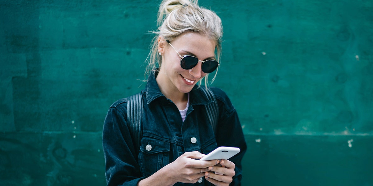 woman looking at phone