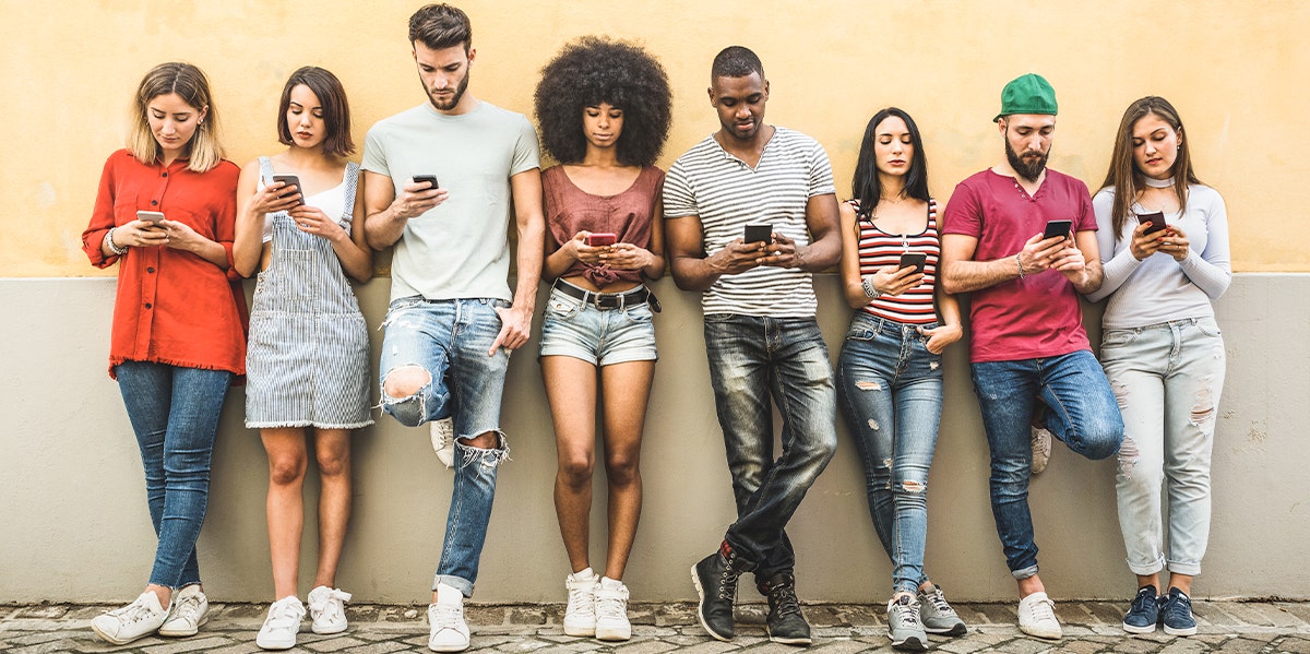 The Lie About Social Media Addiction That Fooled 82 Million People crowd of people on phones