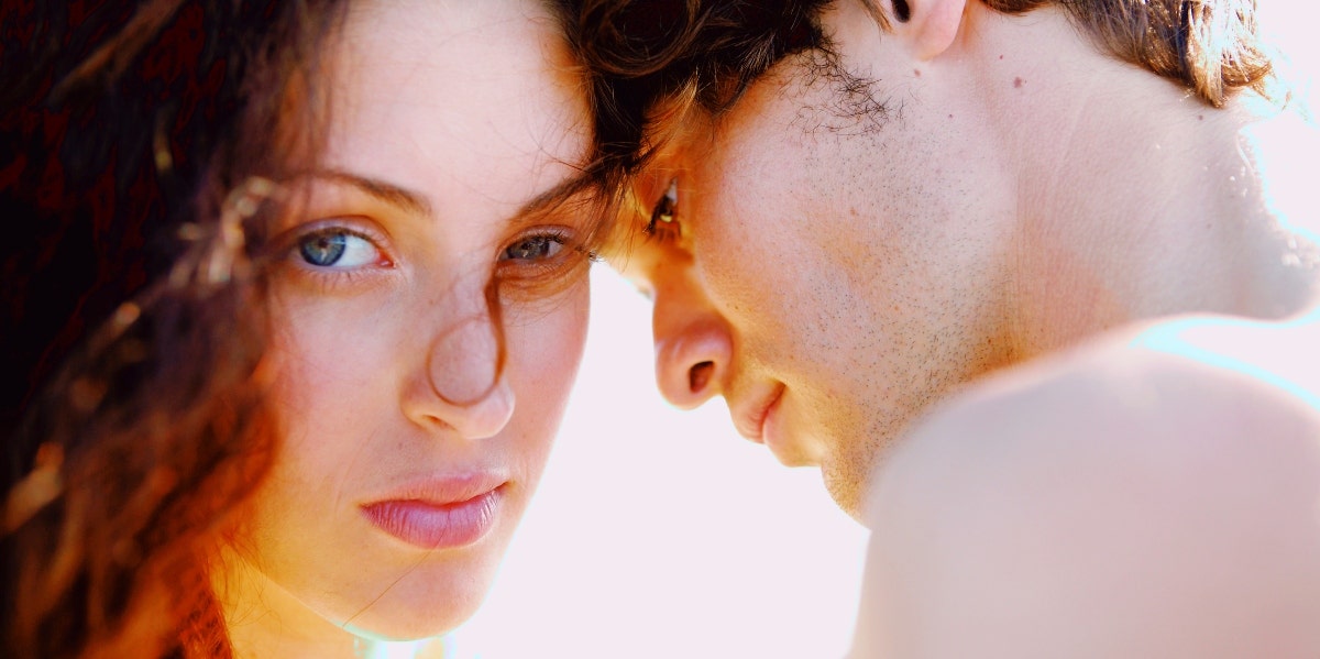 woman making eye contact with man looking away