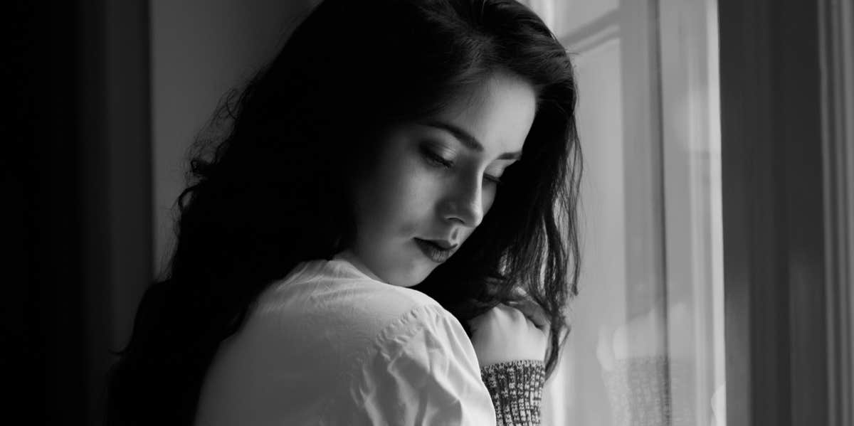 Someday Someone Will Thank You For Letting Me Go sad woman by window