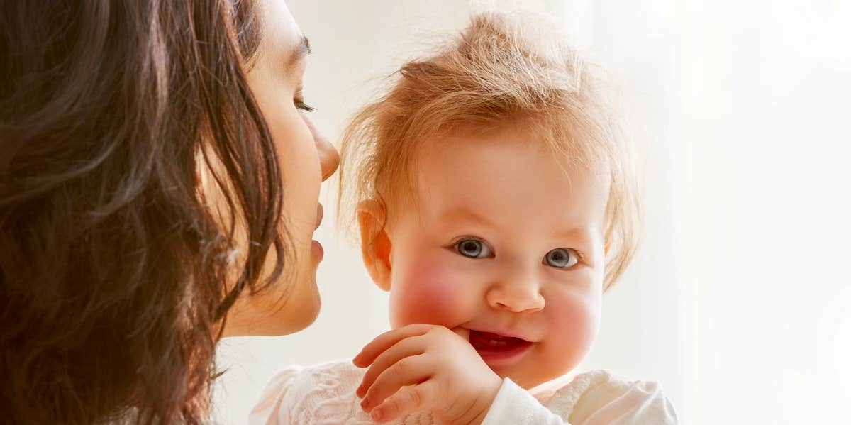 woman holding baby