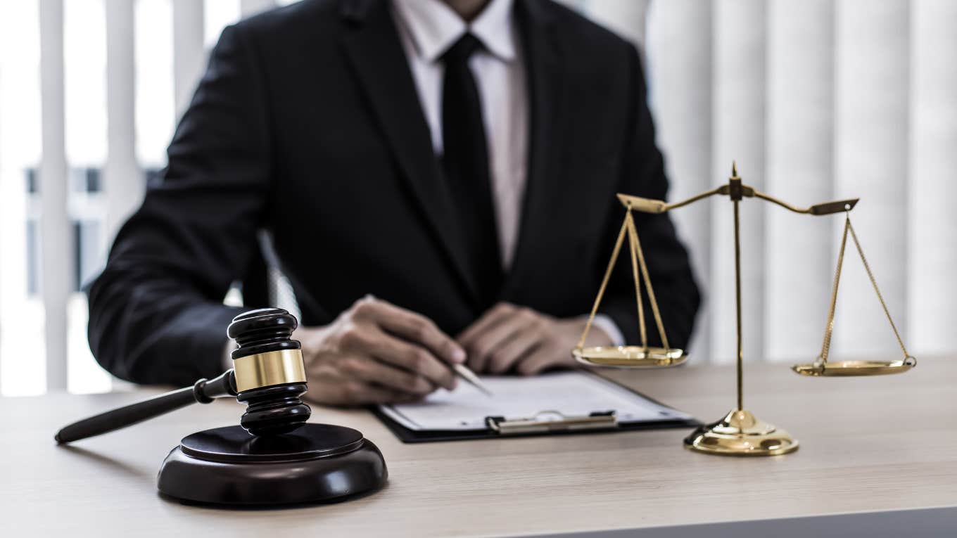 man practicing law at desk