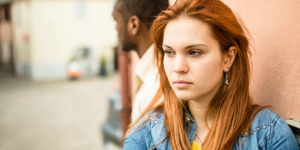 woman who's been betrayed looking away