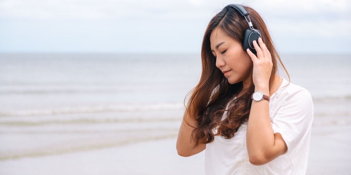 sad woman listening to music