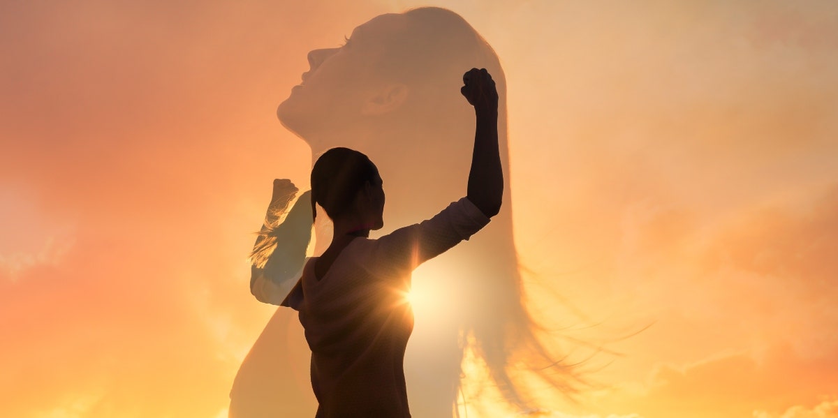 strong woman with fist in the air