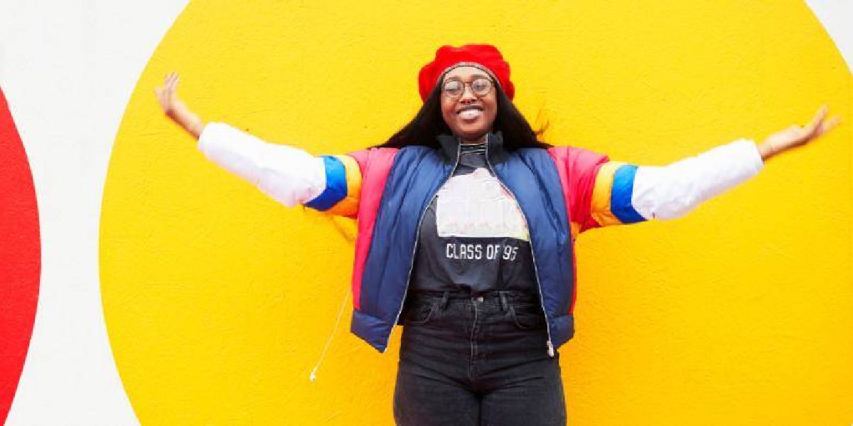 10 Popular Colors + The Spiritual Meaning Of Each woman wearing colorful jacket
