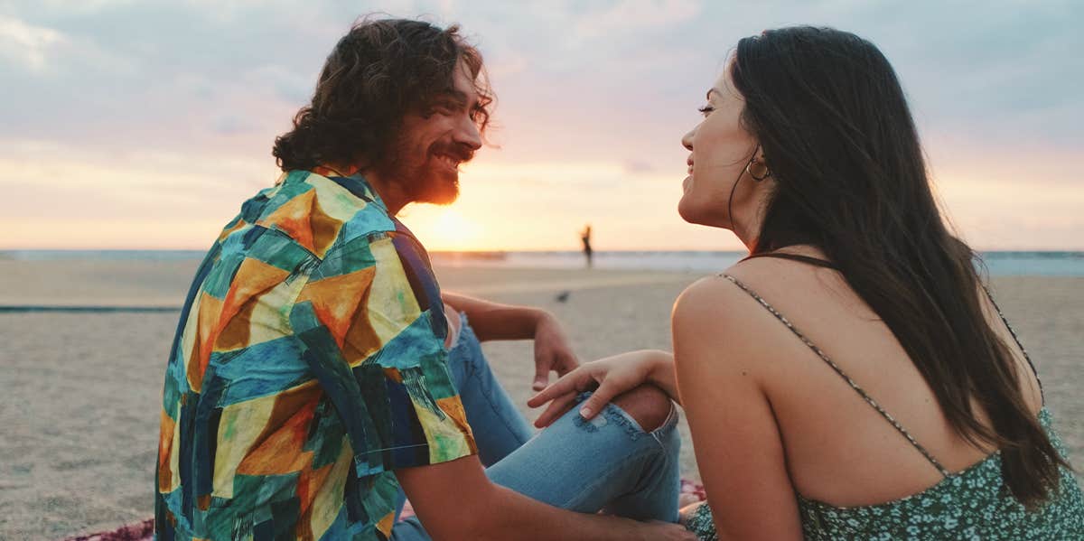 couple sitting on the beach