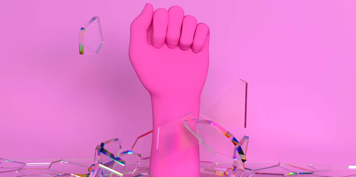 pink hand breaking glass