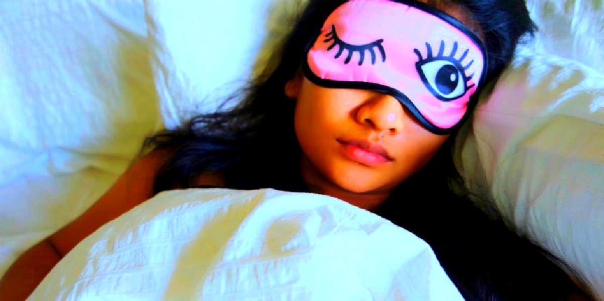 woman sleeping with eye mask on