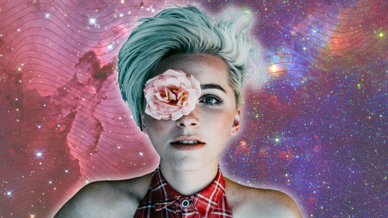 10 Signs You're 'Spiritually Gifted', According To Astrology woman with rose on her face