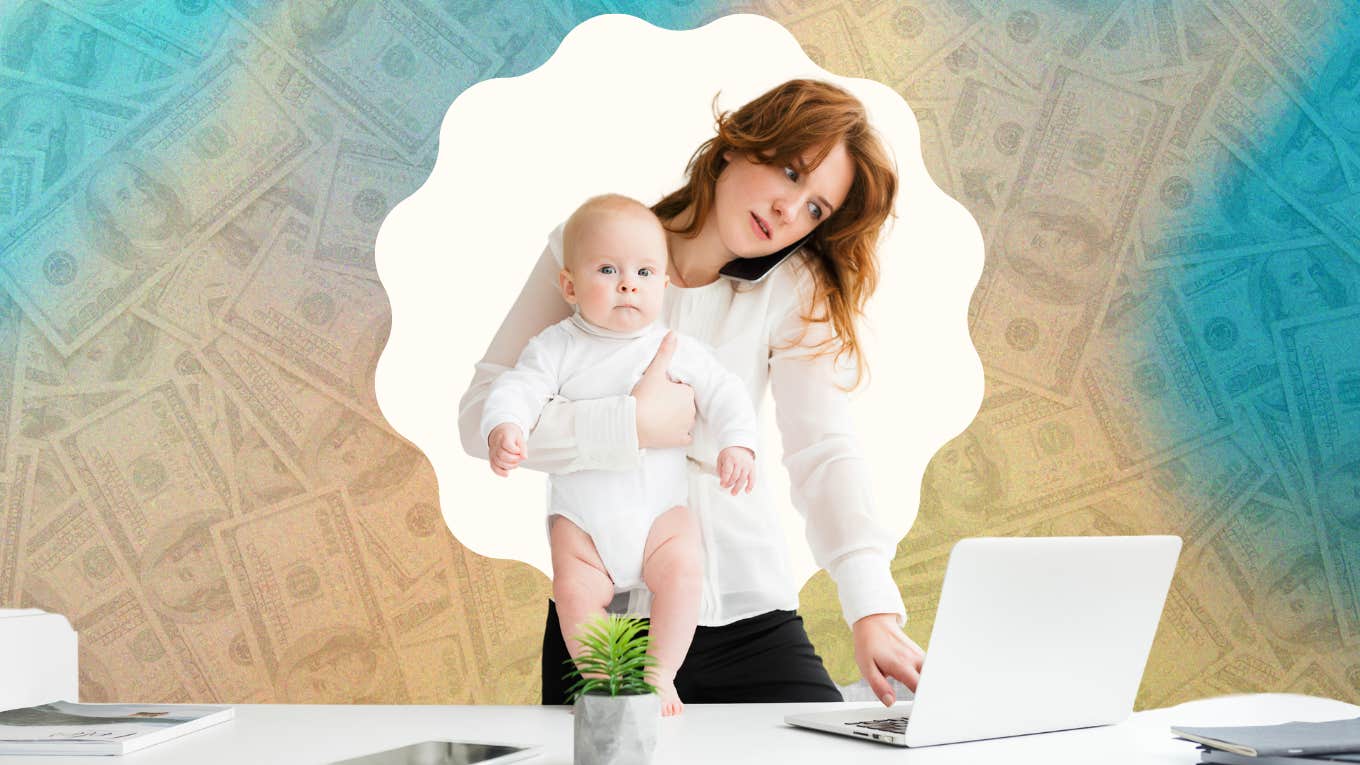 woman holding baby while on the phone and using laptop