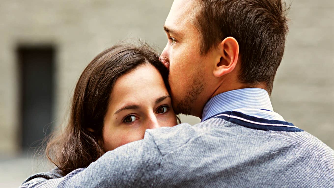 woman looking away from man