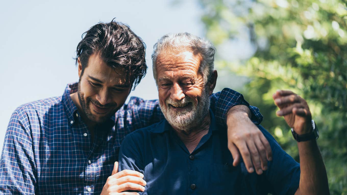 adult and father talking and smiling