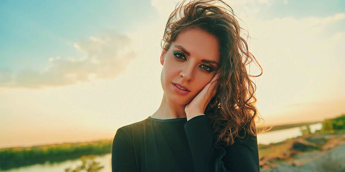 How To Stop Absorbing Other People's Emotions smiling happy woman
