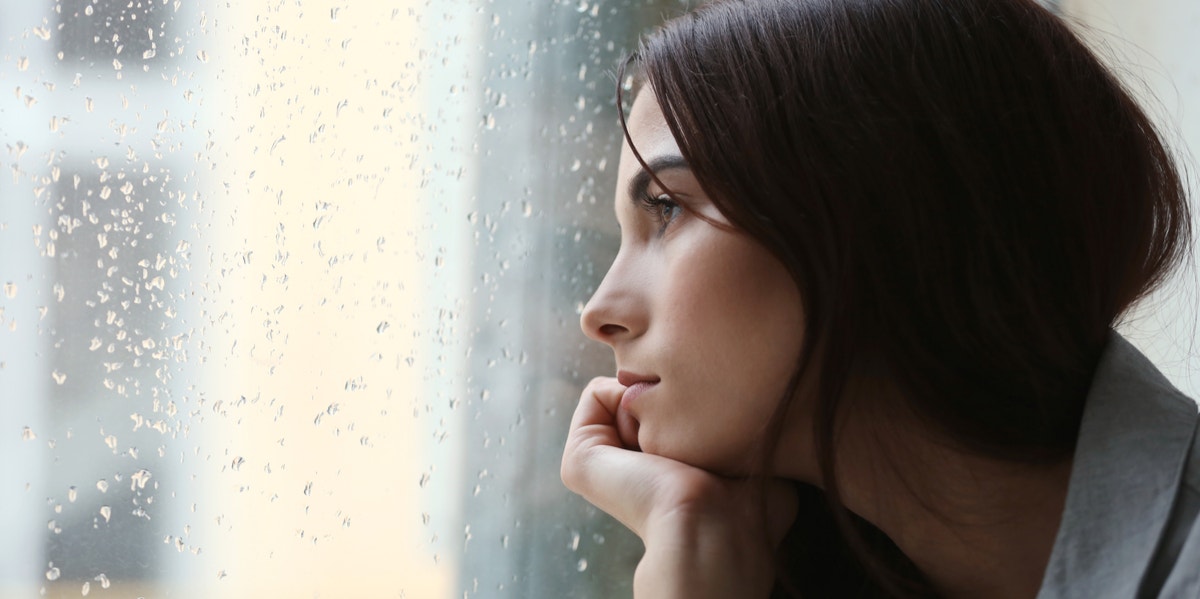 Stop Making Excuses For People Who Hurt You Over And Over Again woman staring out the window