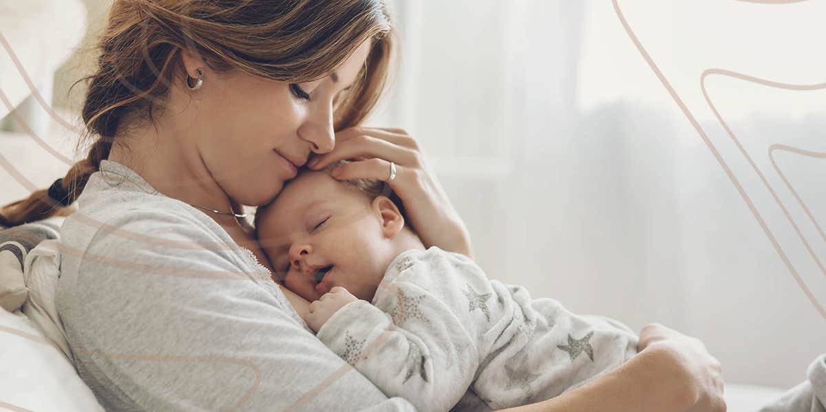 mom holding baby