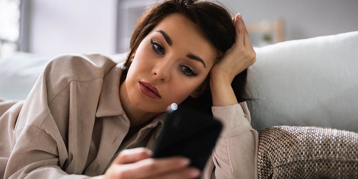 woman texting on phone