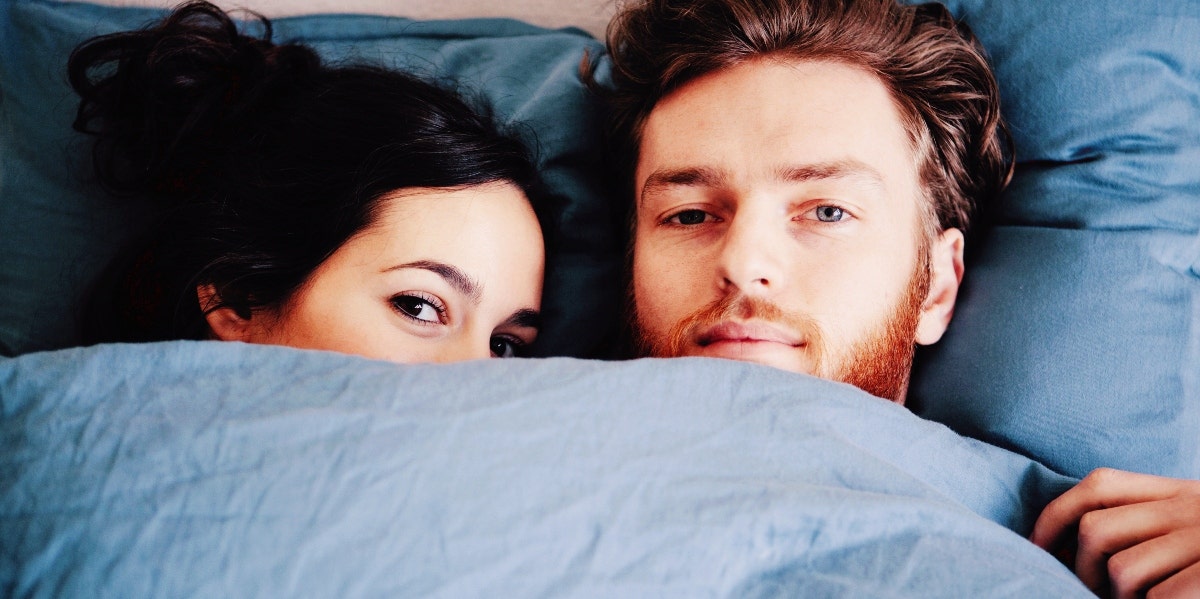 stress and sex couple in bed