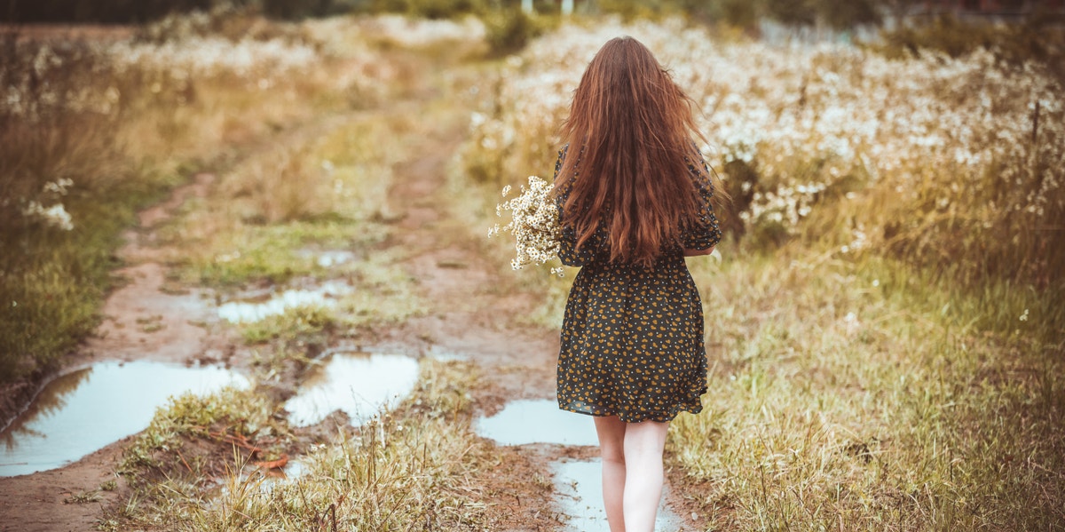 woman walking away