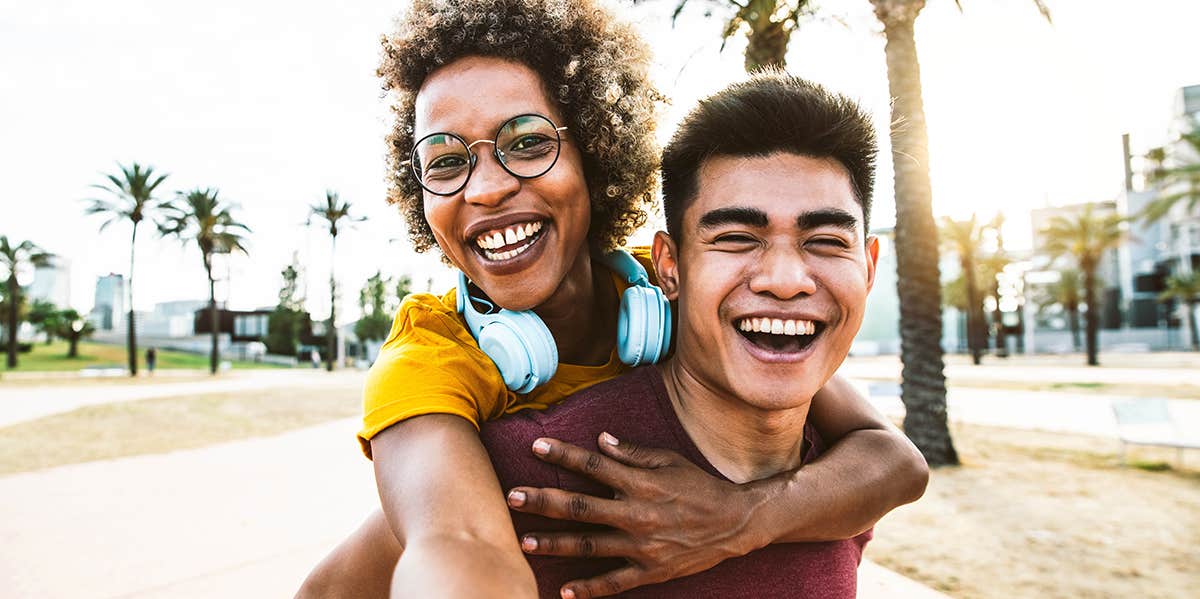 interracial couple smiling selfie