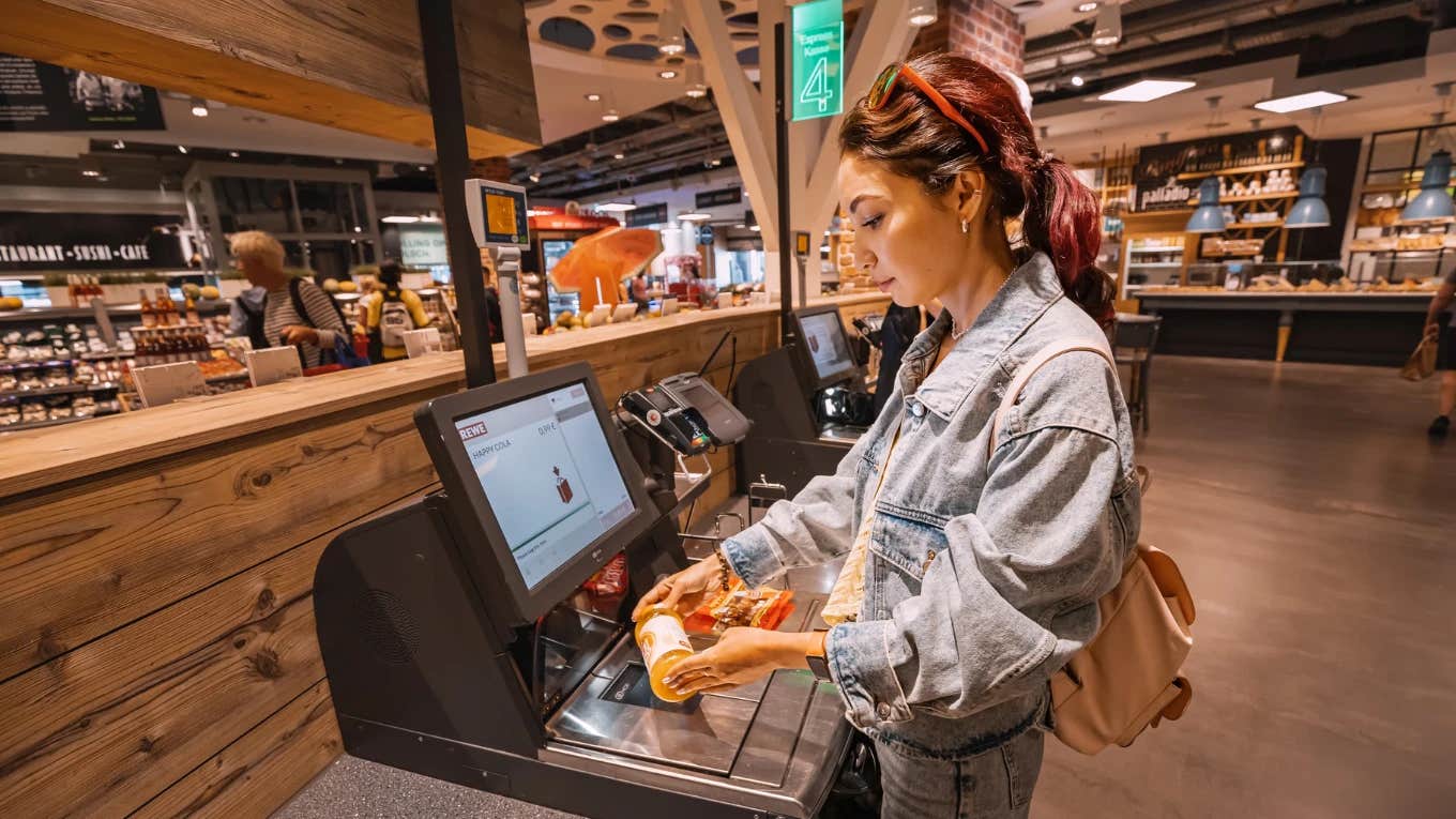 shopper at self-checkout