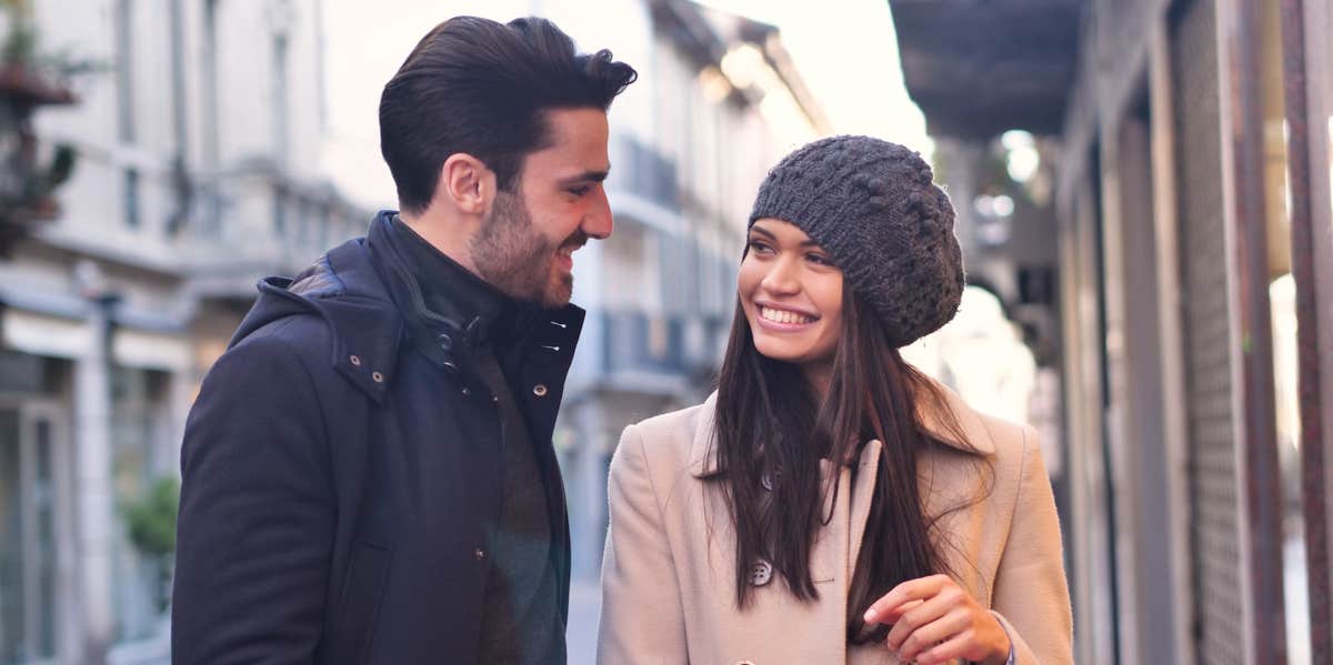 man and woman looking at each other