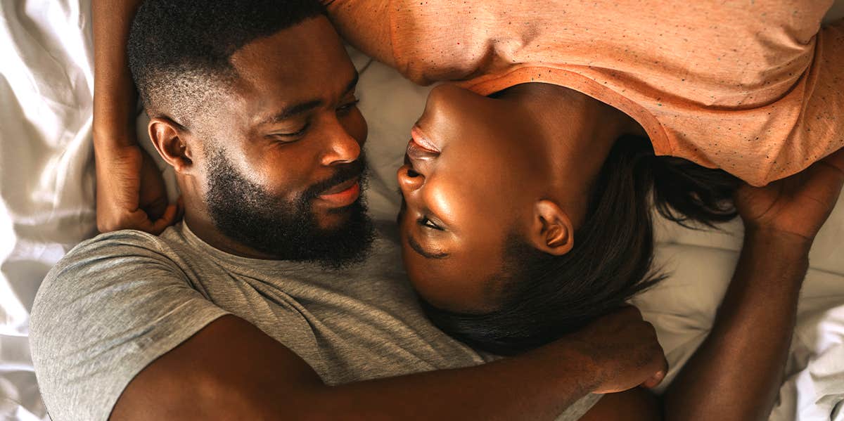 couple in bed cuddling