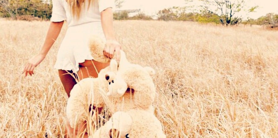 woman with stuffed animal woman with stuffed animal