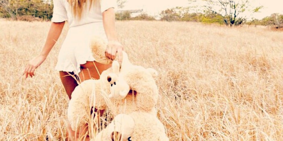 woman with stuffed animal