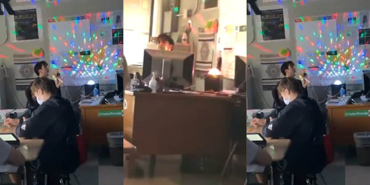 Substitute teacher singing on karaoke machine with light show