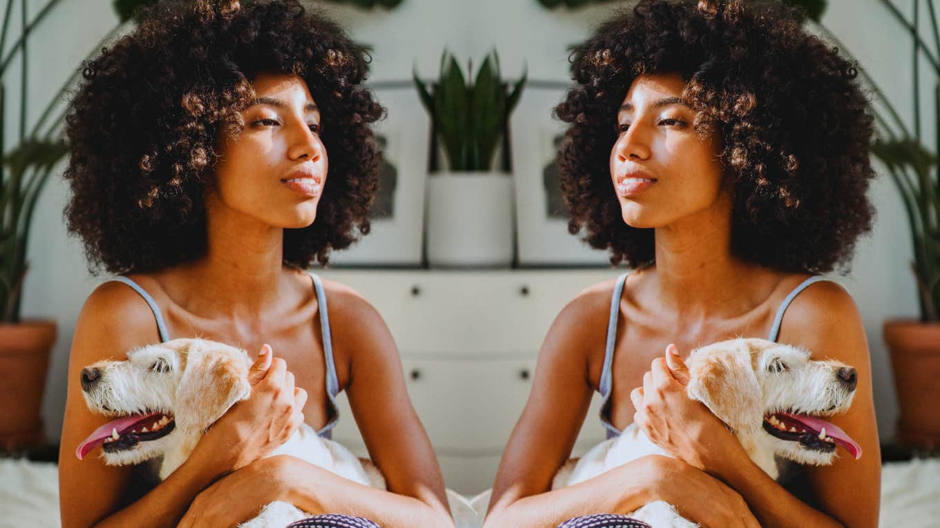 Subtle Behaviours That Make People Admire You Woman holding puppy