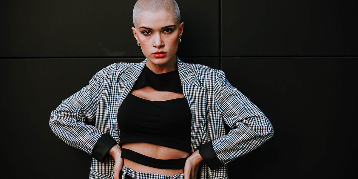 4 Simple Principles To Follow For A Golden Life Of Leisure woman with shaved head in professional dress