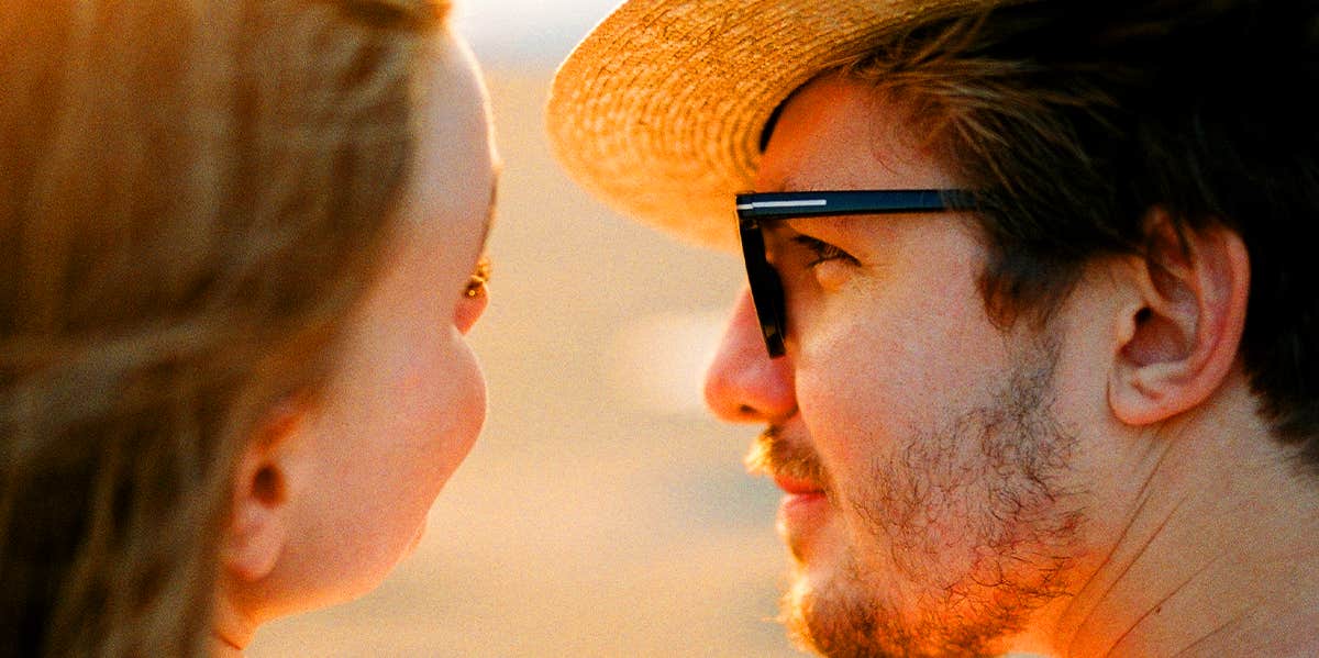 man looking into woman's eyes